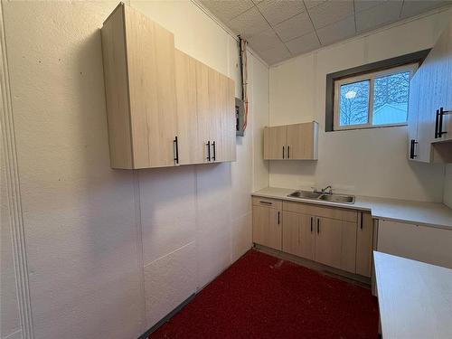 230 2Nd Avenue, Mccreary, MB - Indoor Photo Showing Kitchen With Double Sink