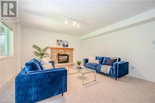 7 Whitetail Court, Guelph, ON - Indoor Photo Showing Living Room With Fireplace