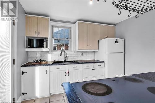 294 East 18Th Street, Hamilton, ON - Indoor Photo Showing Kitchen With Double Sink