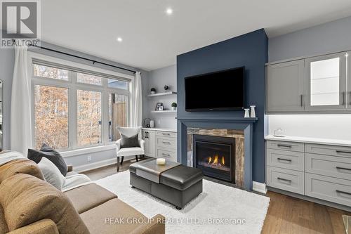 2 - 9245 Shoveller Drive, Niagara Falls (219 - Forestview), ON - Indoor Photo Showing Living Room With Fireplace