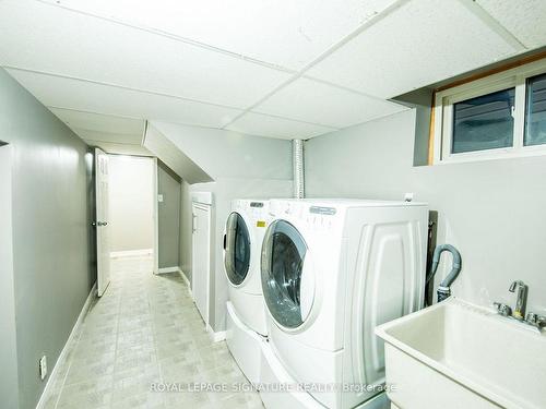 Main-68 Lawson Rd, Toronto, ON - Indoor Photo Showing Laundry Room