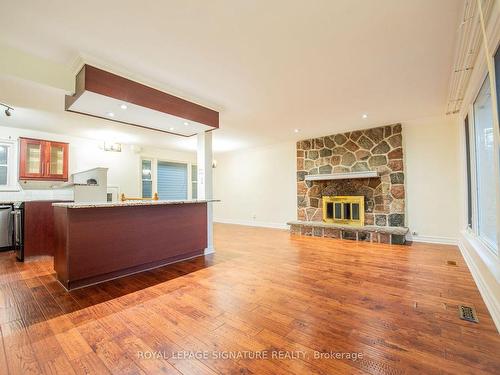 Main-68 Lawson Rd, Toronto, ON - Indoor Photo Showing Other Room With Fireplace