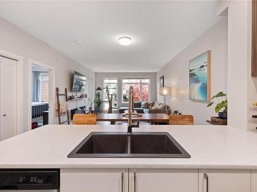 107-6540 Metral Dr, Nanaimo, BC - Indoor Photo Showing Kitchen With Double Sink