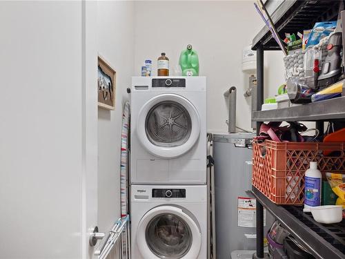 107-6540 Metral Dr, Nanaimo, BC - Indoor Photo Showing Laundry Room