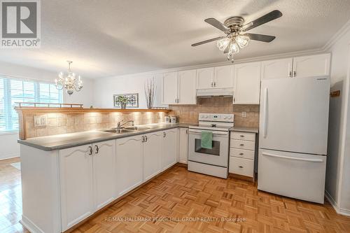 27 Waddington Crescent, Barrie, ON - Indoor Photo Showing Kitchen With Double Sink