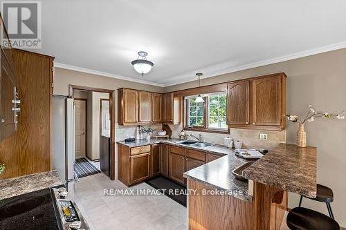 14 Dawson Road, Otonabee-South Monaghan, ON - Indoor Photo Showing Kitchen With Double Sink