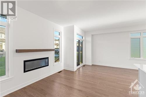 845 Mochi Circle, Ottawa, ON - Indoor Photo Showing Living Room With Fireplace