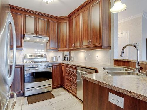 Kitchen - 25 Rue Des Manoirs, Charlemagne, QC - Indoor Photo Showing Kitchen With Double Sink