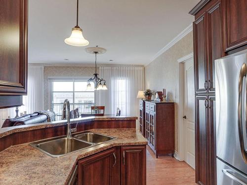 Kitchen - 25 Rue Des Manoirs, Charlemagne, QC - Indoor Photo Showing Kitchen With Double Sink