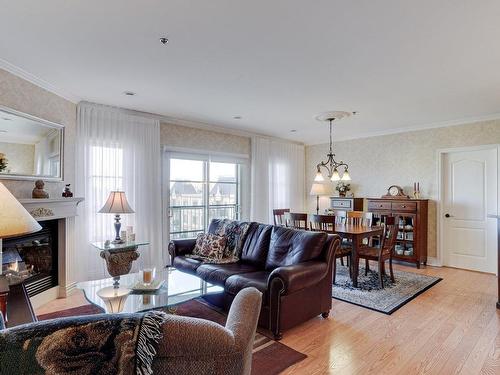 Overall view - 25 Rue Des Manoirs, Charlemagne, QC - Indoor Photo Showing Living Room With Fireplace