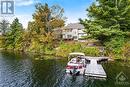 Gracious 4 bedroom, 3 full bathroom home with 7 acres on Long Lake - 4055 Hanley Lane, Perth, ON  - Outdoor With Body Of Water 