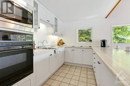 Kitchen offers lots of prep areas and dishwasher 2024 - 4055 Hanley Lane, Perth, ON - Indoor Photo Showing Kitchen