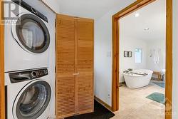 Main floor laundry station with new 2021 washer and dryer - 