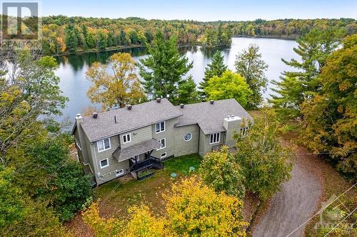 The 7 acres includes 763 feet of  waterfront - 4055 Hanley Lane, Perth, ON - Outdoor With Body Of Water With View