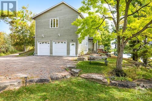 Attached double garage is insulated and has workshop - 4055 Hanley Lane, Perth, ON - Outdoor