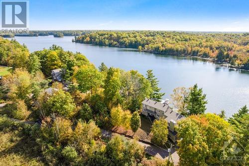 Luxury living on desirable Long Lake, Lake, 20 mins from Perth - 4055 Hanley Lane, Perth, ON - Outdoor With Body Of Water With View