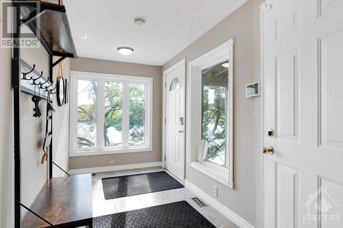 Welcoming light-filled foyer - 4055 Hanley Lane, Perth, ON - Indoor Photo Showing Other Room