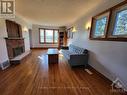 5687 First Line Road, Ottawa, ON  - Indoor Photo Showing Living Room With Fireplace 