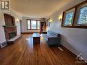 5687 First Line Road, Manotick, ON  - Indoor Photo Showing Living Room With Fireplace 