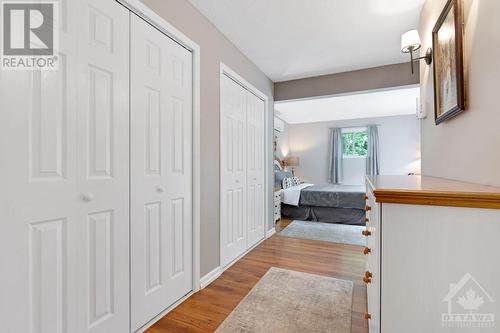 Primary bedroom closets with interior shelving system - 479 Drummond Concession 11 Road, Carleton Place, ON - Indoor Photo Showing Other Room