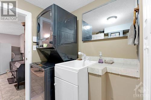 Lower level powder room with laundry station - 479 Drummond Concession 11 Road, Carleton Place, ON - Indoor Photo Showing Laundry Room