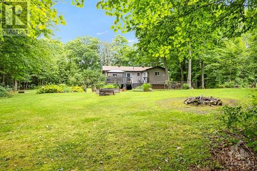 Landscaped yards, perennial gardens and firepits - 479 Drummond Concession 11 Road, Carleton Place, ON - Outdoor