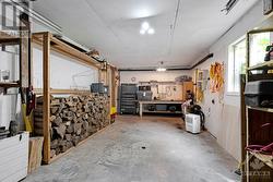 Attached garage with workshop, entry via lower level - 