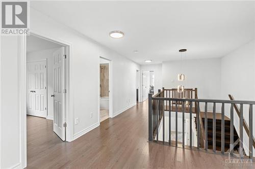 Upper Level- Hallway w/ hardwood floors and natural light throughout. - 272 Big Dipper Street, Ottawa, ON - Indoor Photo Showing Other Room