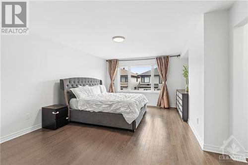 Primary bedroom w/ expansive window. - 272 Big Dipper Street, Ottawa, ON - Indoor Photo Showing Bedroom