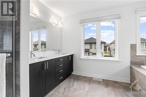 5 Piece primary en suite w/ glass rain shower, built in soaker tub & private toilet space. - 272 Big Dipper Street, Ottawa, ON - Indoor Photo Showing Bathroom