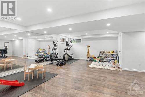 Lower Level- Recreation room w/ pot lights & full egress windows. - 272 Big Dipper Street, Ottawa, ON - Indoor Photo Showing Gym Room