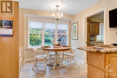 Sun-filled dinette has door to large back deck - 28 Mountain View Lane, Westport, ON - Indoor Photo Showing Dining Room