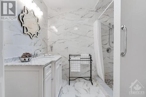 Luxury ensuite has marble vanity and ceramic shower - 28 Mountain View Lane, Westport, ON -  Photo Showing Bathroom