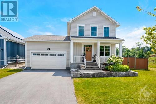 New 2022 home with eco-friendly sustainability - 27 Shelter Cove Drive, Westport, ON - Outdoor With Deck Patio Veranda With Facade