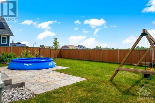 Quality fencing encloses yard for children and pets - 27 Shelter Cove Drive, Westport, ON - Outdoor With Backyard