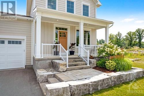 27 Shelter Cove Drive, Westport, ON - Outdoor With Deck Patio Veranda With Facade