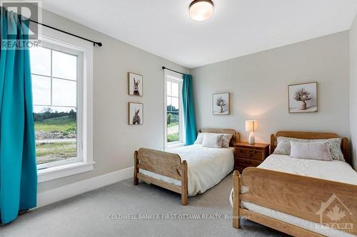 27 Shelter Cove Drive, Westport, ON - Indoor Photo Showing Bedroom