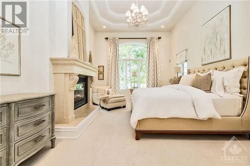 6197 Ottawa Street, Richmond, ON - Indoor Photo Showing Bedroom With Fireplace