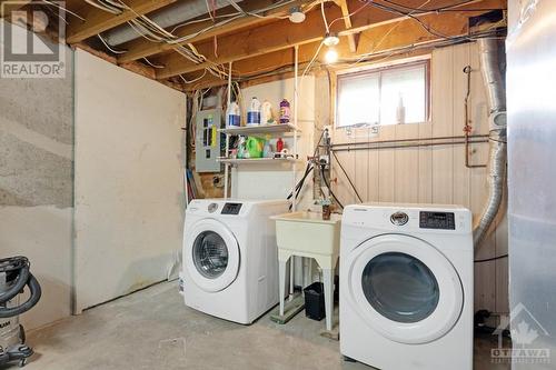 Laundry area with convenient laundry tub - 9334 Branch Road, North Augusta, ON - Indoor Photo Showing Laundry Room