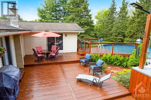 Deck access to above-ground pool, 27' diameter and 4' deep - with new 2023 liner - 9334 Branch Road, North Augusta, ON - Outdoor With Deck Patio Veranda With Exterior