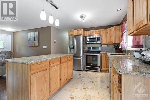 Kitchen granite countertops and upscale cabintry - 9334 Branch Road, North Augusta, ON - Indoor Photo Showing Kitchen