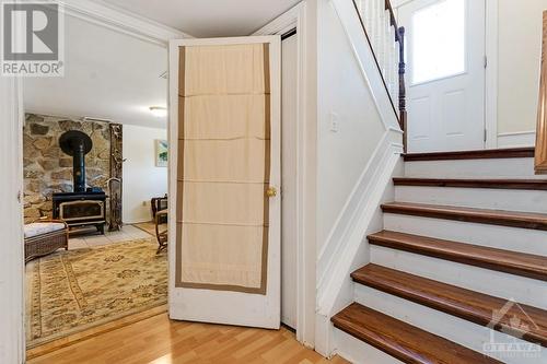 Stairs to finished lower level - 124 Second Avenue, Carleton Place, ON - Indoor Photo Showing Other Room With Fireplace