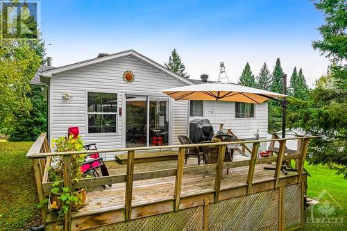 Main floor patio doors to large deck with BBQ hookup - 124 Second Avenue, Carleton Place, ON - Outdoor With Exterior