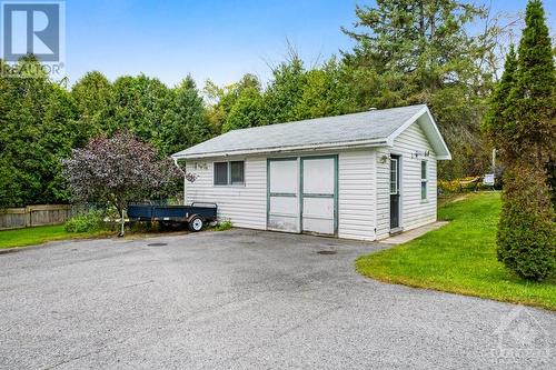 Detached finished garage-workshop has 40 amps, propane heater, wall AC and roof shingles 2019 - 124 Second Avenue, Carleton Place, ON - Outdoor