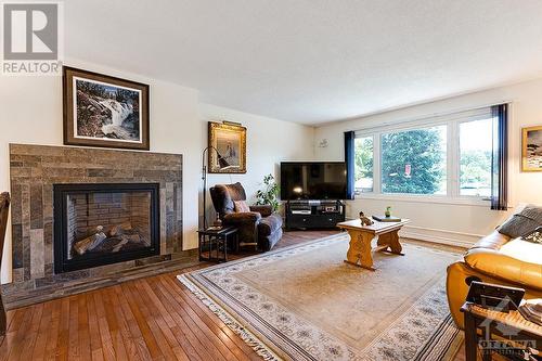 Spacious light-filled living room - 124 Second Avenue, Carleton Place, ON - Indoor Photo Showing Living Room With Fireplace