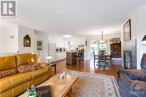 Open floor plan with clear sightlines - 124 Second Avenue, Carleton Place, ON - Indoor Photo Showing Living Room With Fireplace