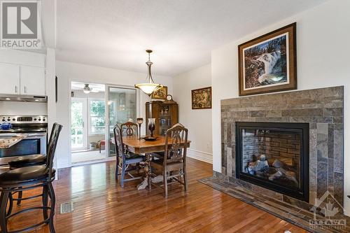 Attractive propane fireplace with tile surround - 124 Second Avenue, Carleton Place, ON - Indoor With Fireplace