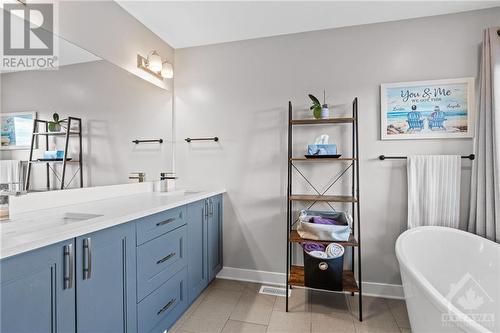 Primary en suite w/ dual sinks and private toilet space. - 68 Hubble Heights, Ottawa, ON - Indoor Photo Showing Bathroom