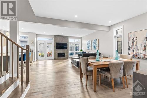 68 Hubble Heights, Ottawa, ON - Indoor Photo Showing Dining Room With Fireplace