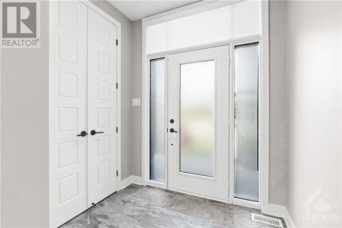 Tiled front foyer w/ double closet. - 68 Hubble Heights, Ottawa, ON - Indoor Photo Showing Other Room